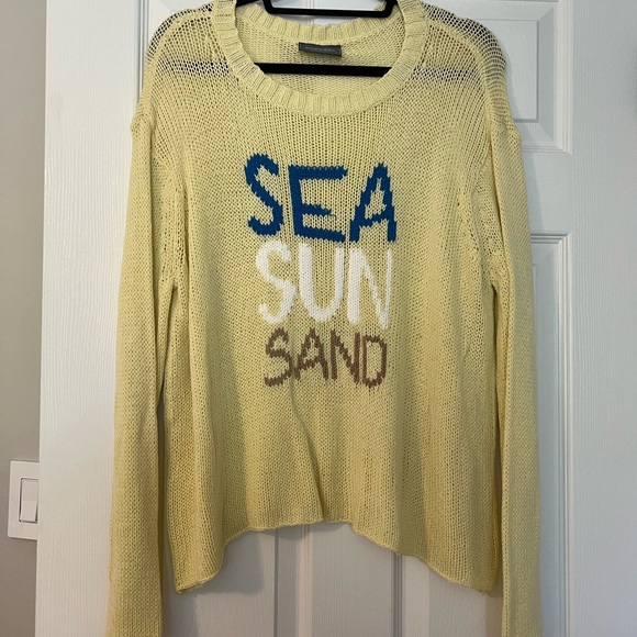 Wooden Ships Yellow Sweater with Blue, White, and Brown Text - Picture 1 of 3